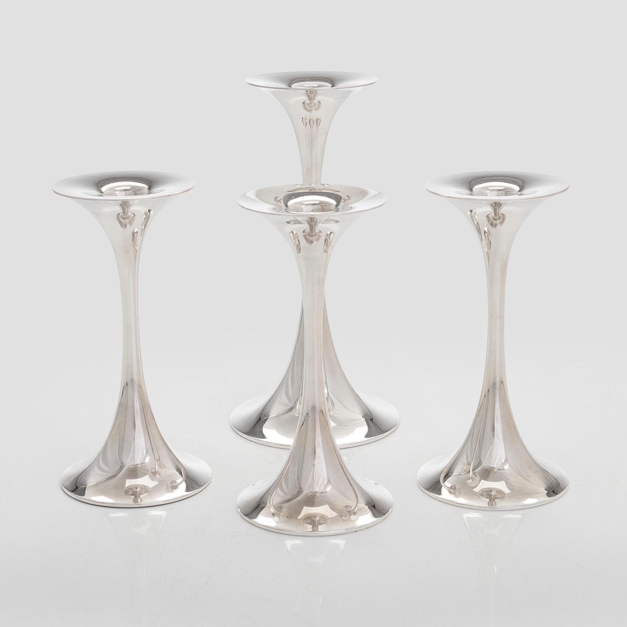 Tapio Wirkkala, A set of four silver candlesticks, "Trumpetti", Kultakeskus, Hämeenlinna 1979 and 1990.