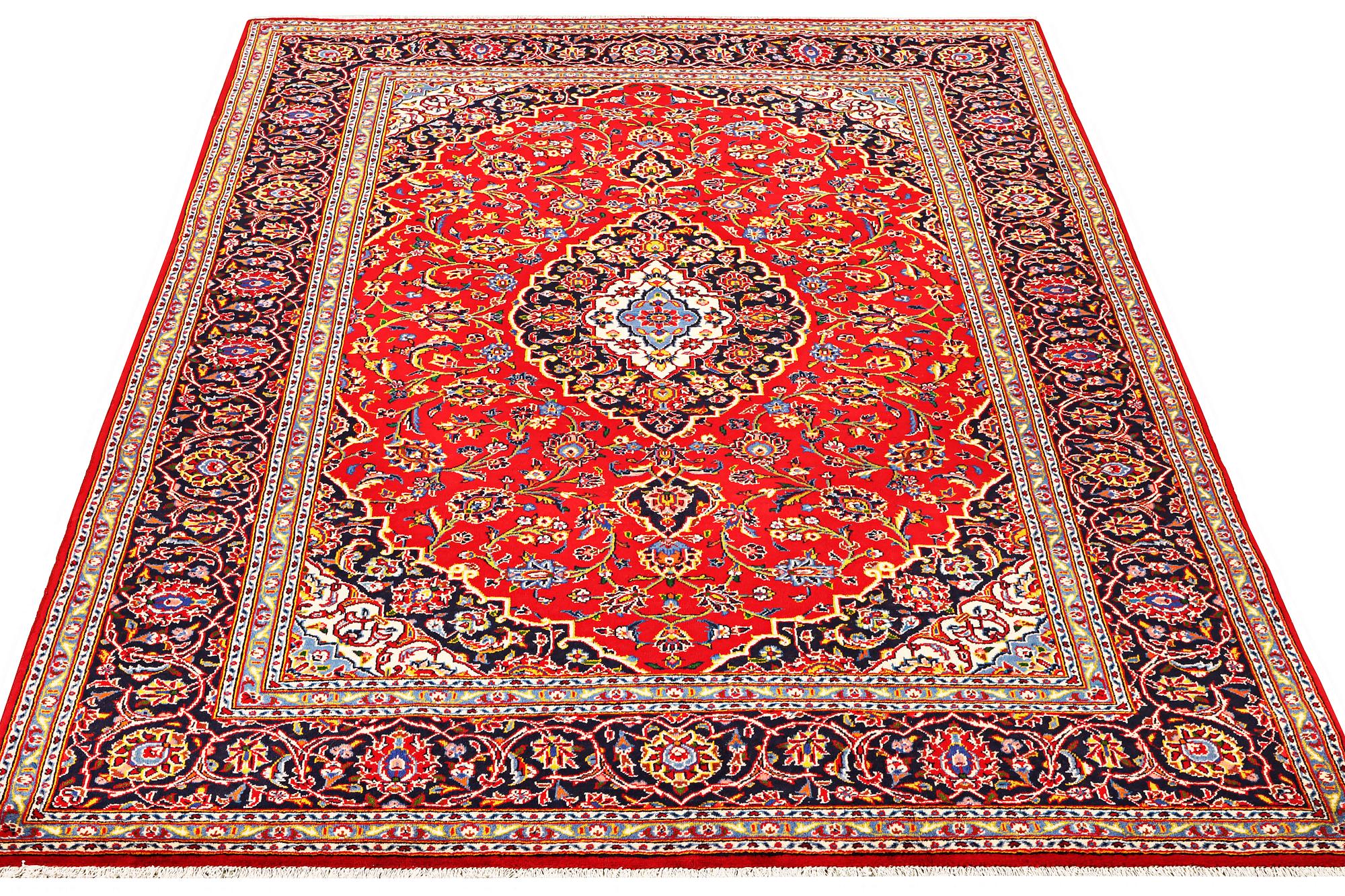A Kashan carpet, a. 305 x 200 cm.