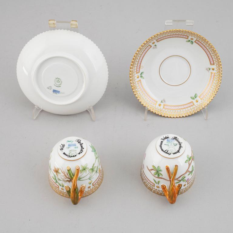 A pair of Royal Copenhagen 'Flora Danica' coffee cups with saucers, Denmark.