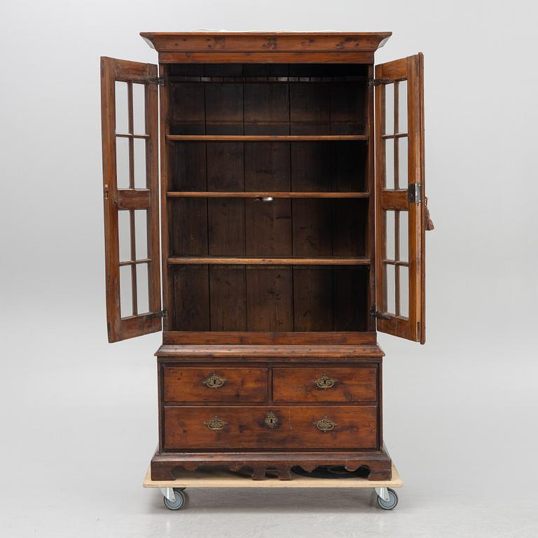 A 18th century vitrine cabinet.