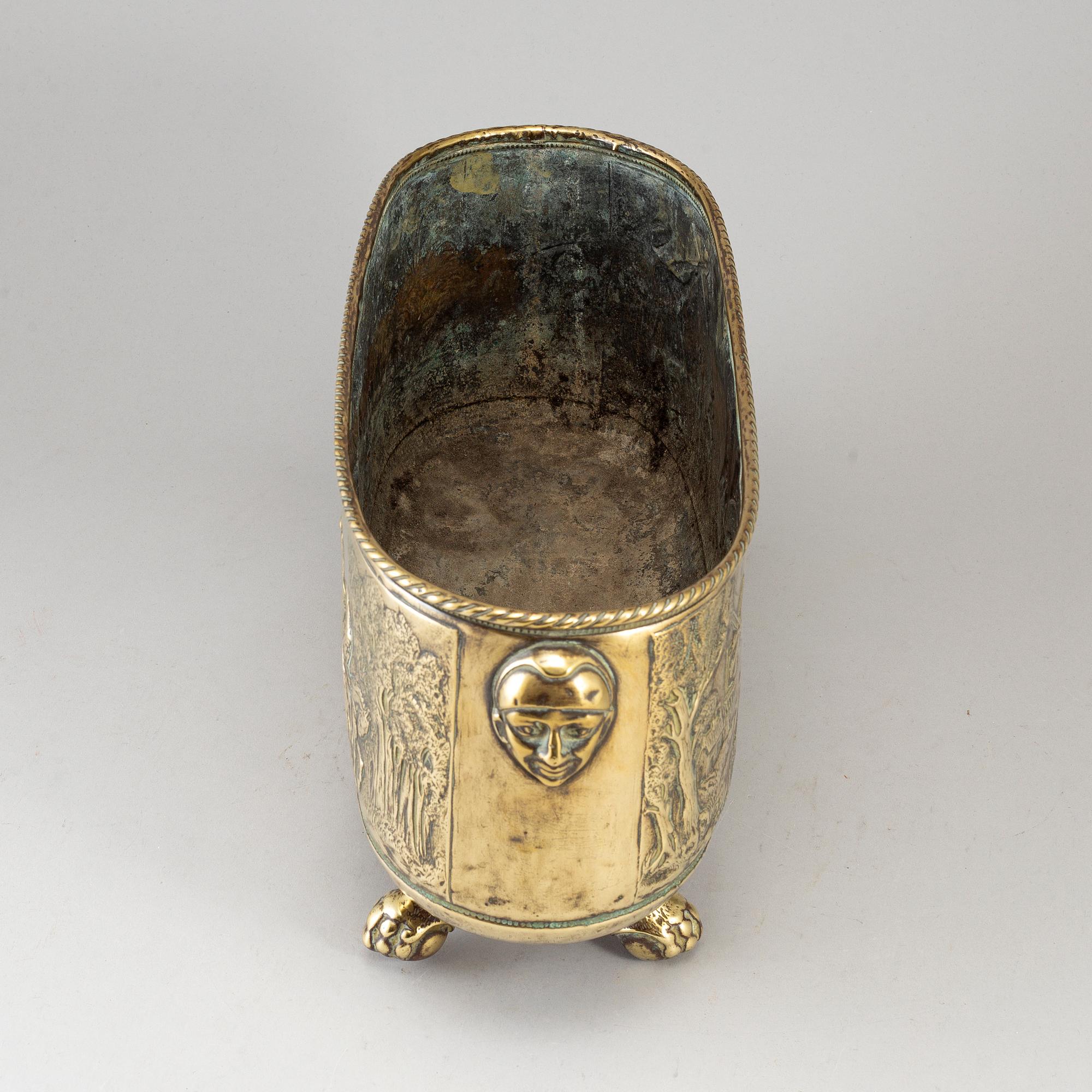 A 19th century brass jardiniere.