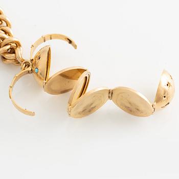 Armband, 18K guld med två stora berlocker.