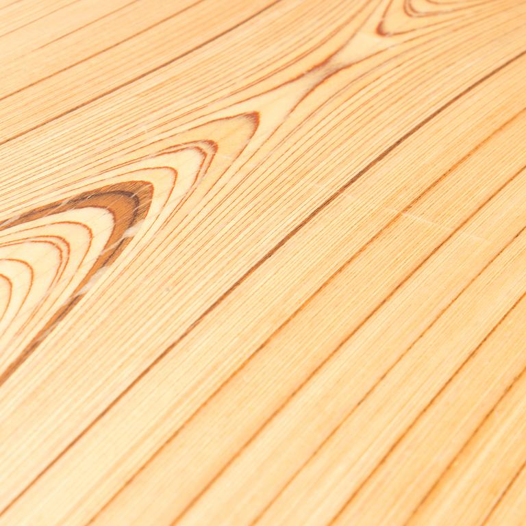 A coffee table marked Tapio Wirkkala, Asko, Made in Finland.