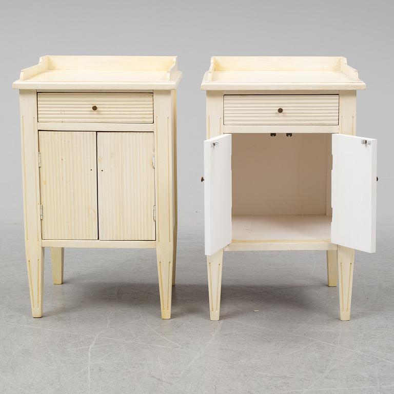 A pair of gustavian style bedside tables, late 20th century.