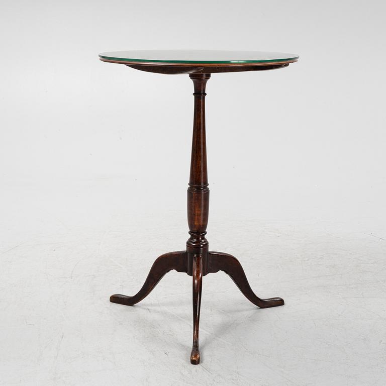 A mahognay side table, 19th Century.