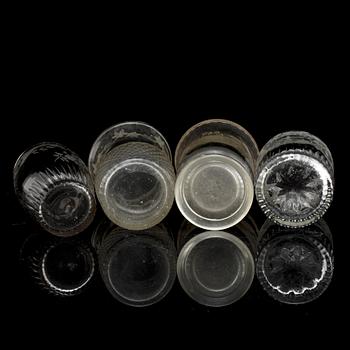 A set of four odd beaker glases, 19th Century.