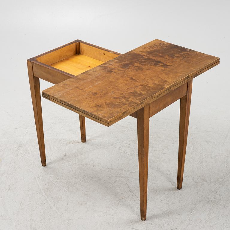 A birch card table, 20th Century.