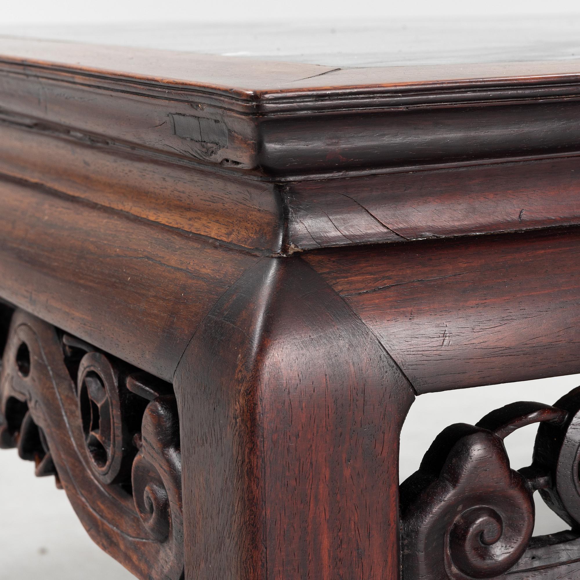 A Chinese dreamstone low table, 20th Century.