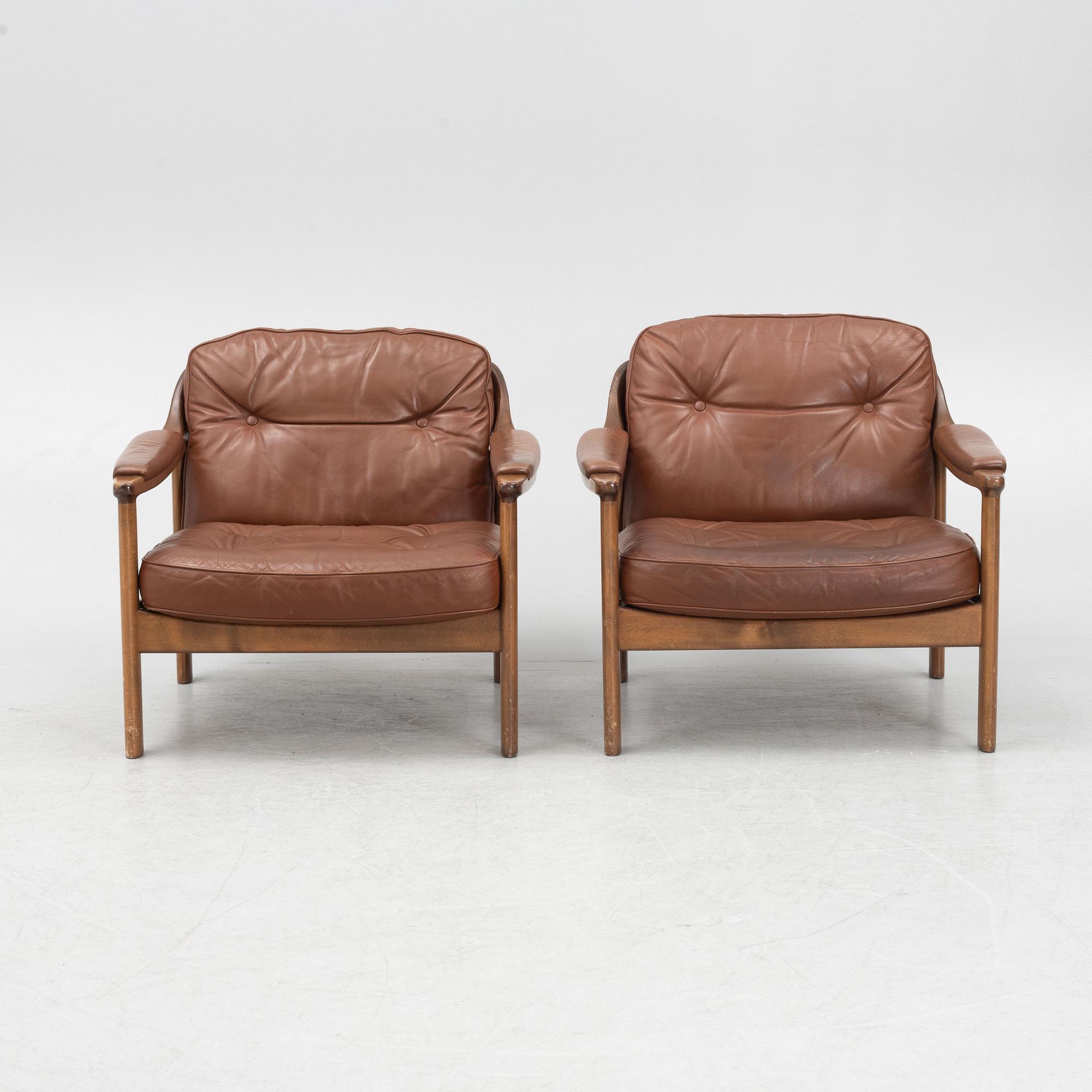 A pair of 1970's armchairs.
