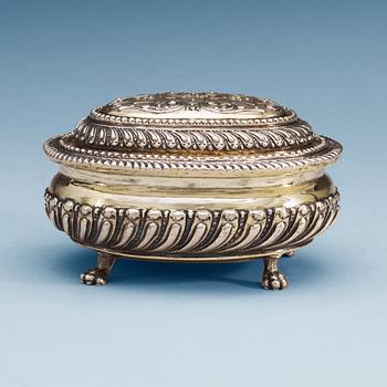 890. A German early 18th century silver-gilt toilette-box, makers mark possibly of Peter Weron, Augsburg 1708-1710.