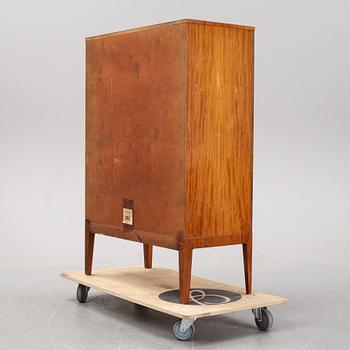 A 1940's Swedish Modern mahogany cabinet from Möbelbolaget.