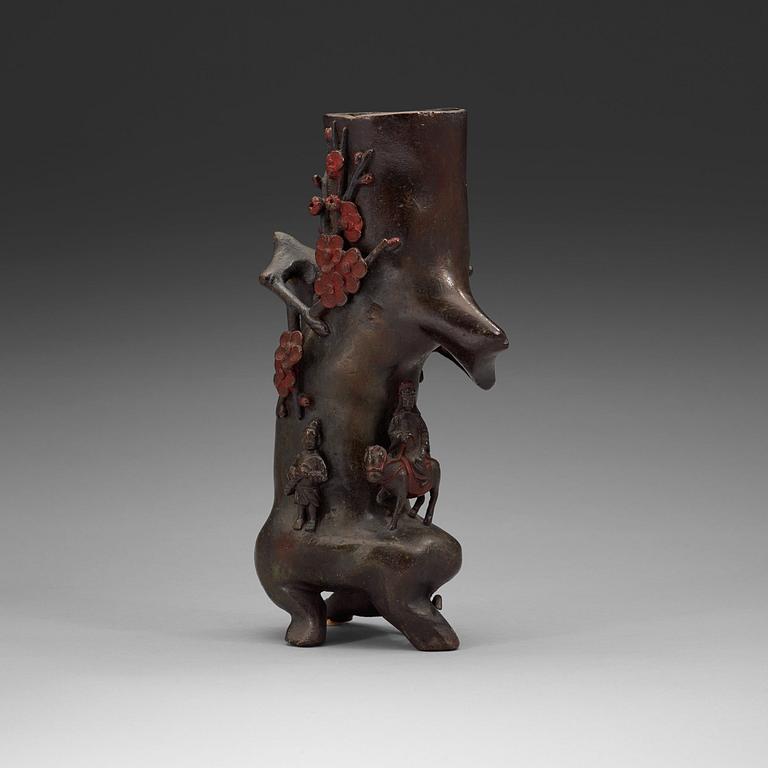 A bronze three trunk shaped vase, Qing dynasty (1644-1912).