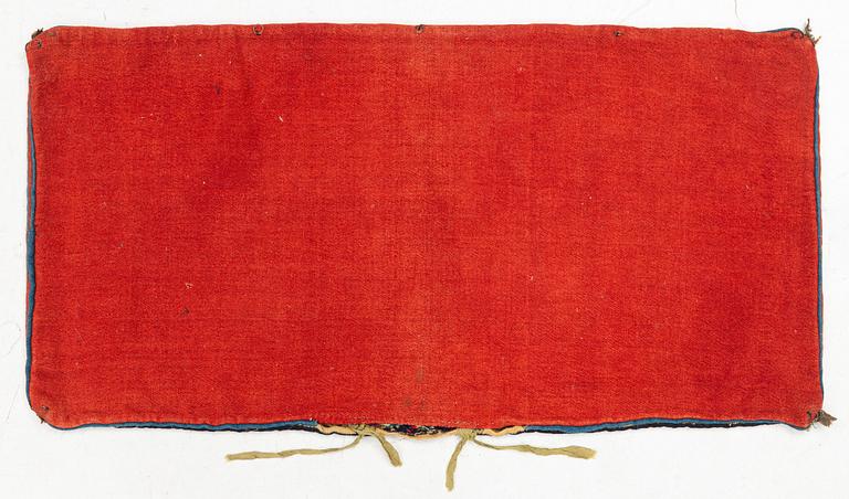 A carrige cushion, 'Träd och timglas', double-interlocked tapestry, c. 102 x 53 cm, signed BID IÅ, dated 1807.