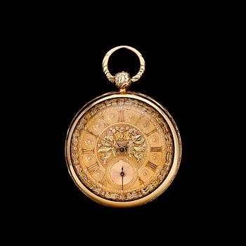 1114. A gold pocket watch.