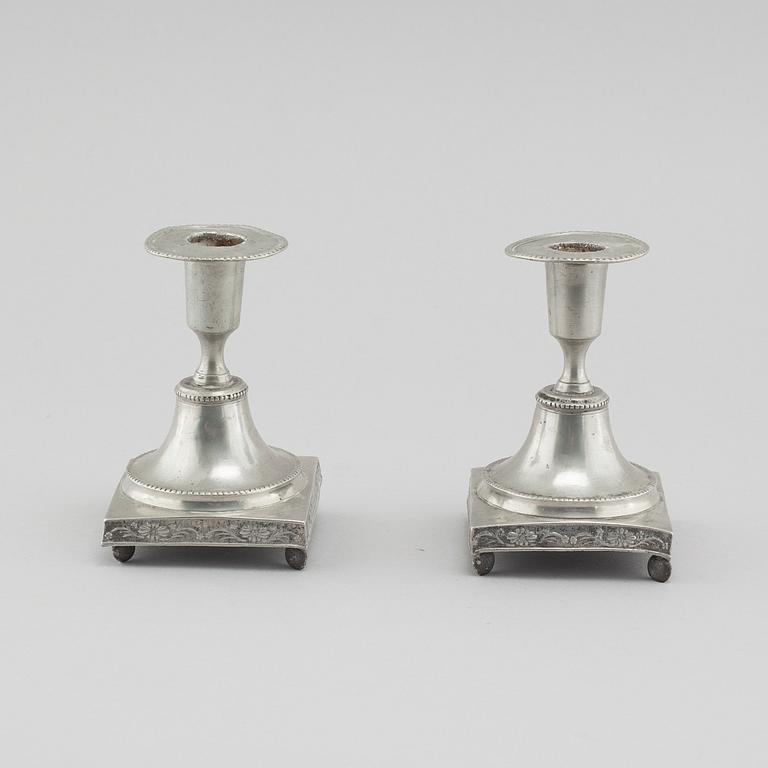 A pair of pewter candlesticks, probably by Gustaf Frederic Wigholm in Eskilstuna, first half of the 19th century.