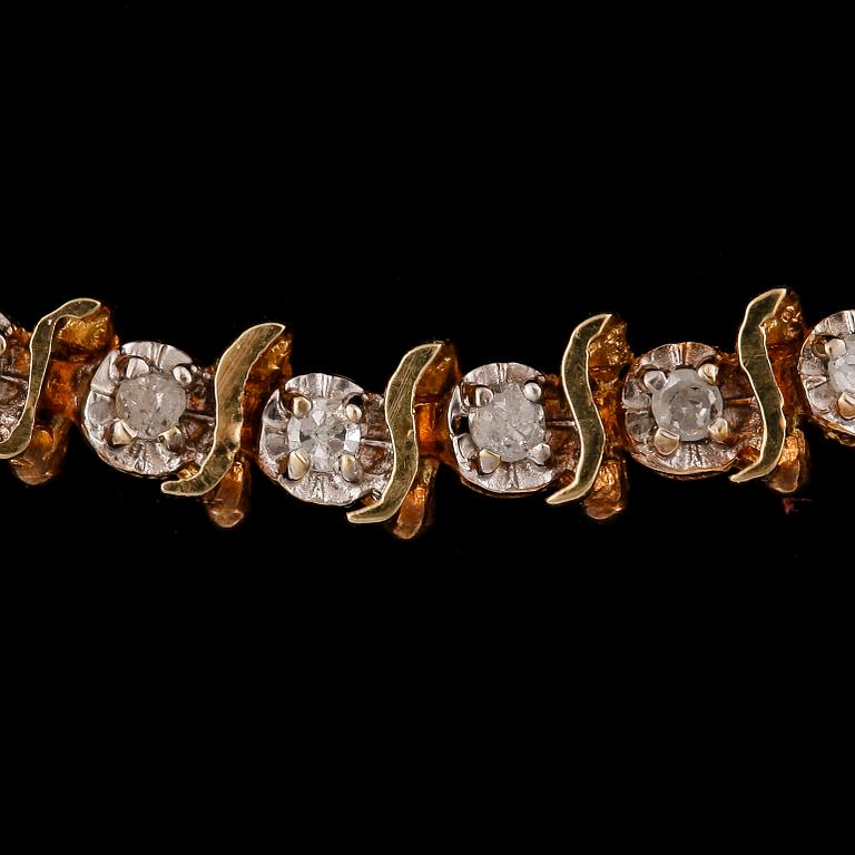 ARMBAND, sk tennisarmband, 14k guld med diamanter tot ca0,46ct. Vikt 5,7g.