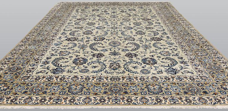 A Royal Keshan carpet, signed, c 403 x 291 cm.