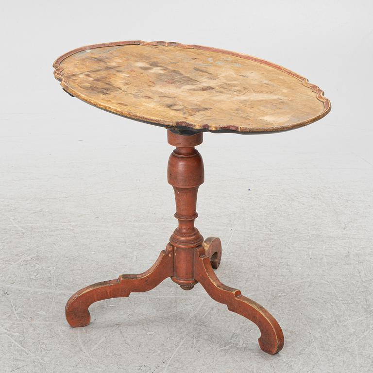 A folding table, 19th century.