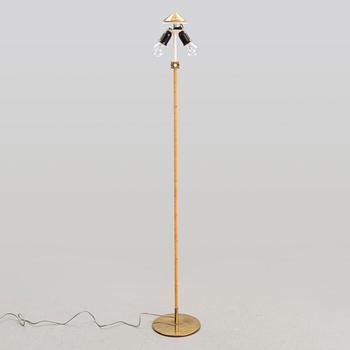 A mid-20th century floor lamp for Taito, Finland.