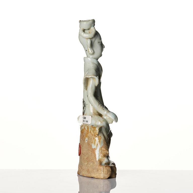 Figurin, vitglaserad. Yuan/Mingdynastin.