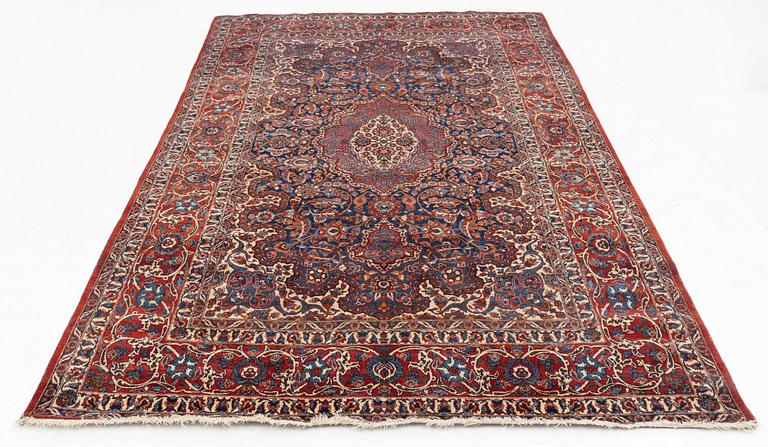 A semi-antique Isfahan rug, central Persia, c. 305 x 205 cm.