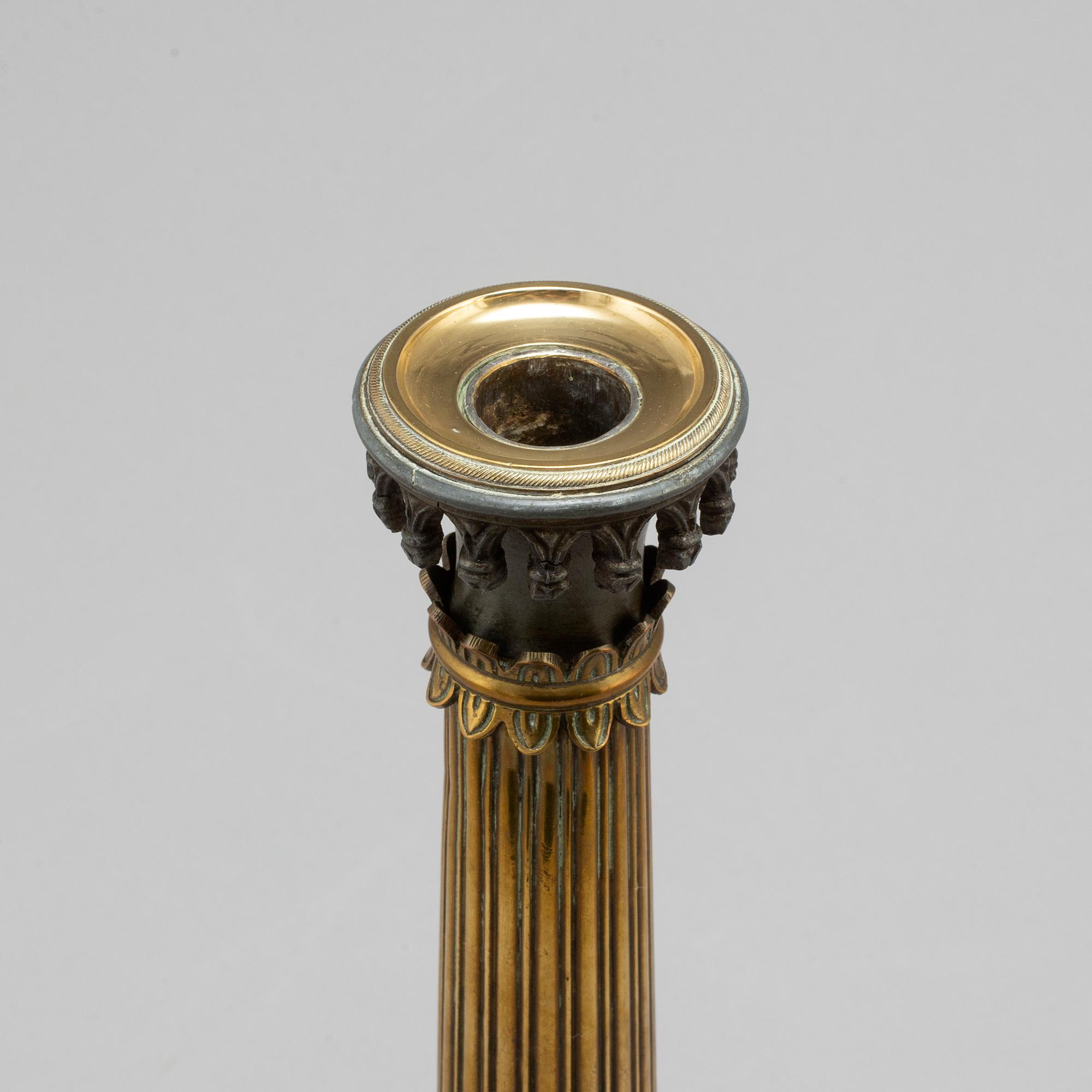 A mid 19th century late empire candlestick.