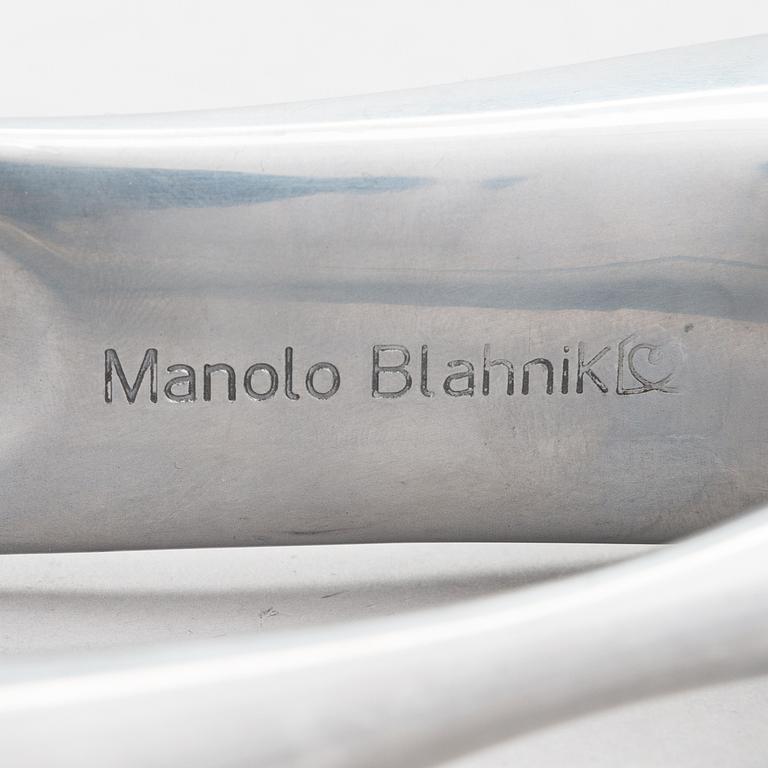 A metal shoe horn by Manolo Blahnik, 2000s.