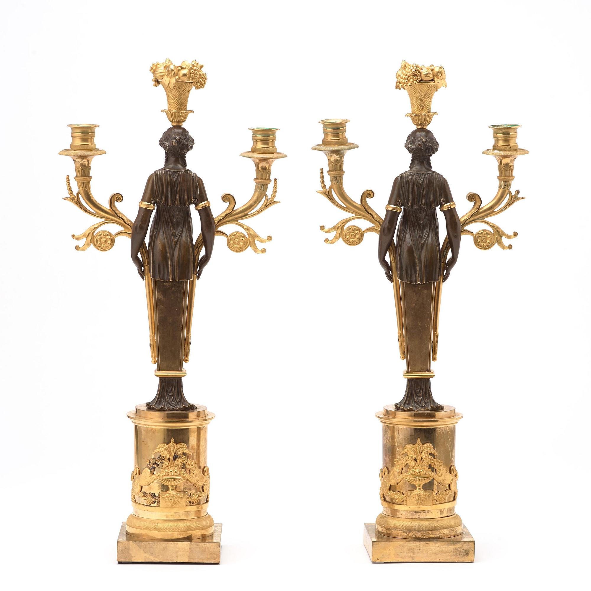 A pair of Swedish Empire early 19th century three-light candelabra.