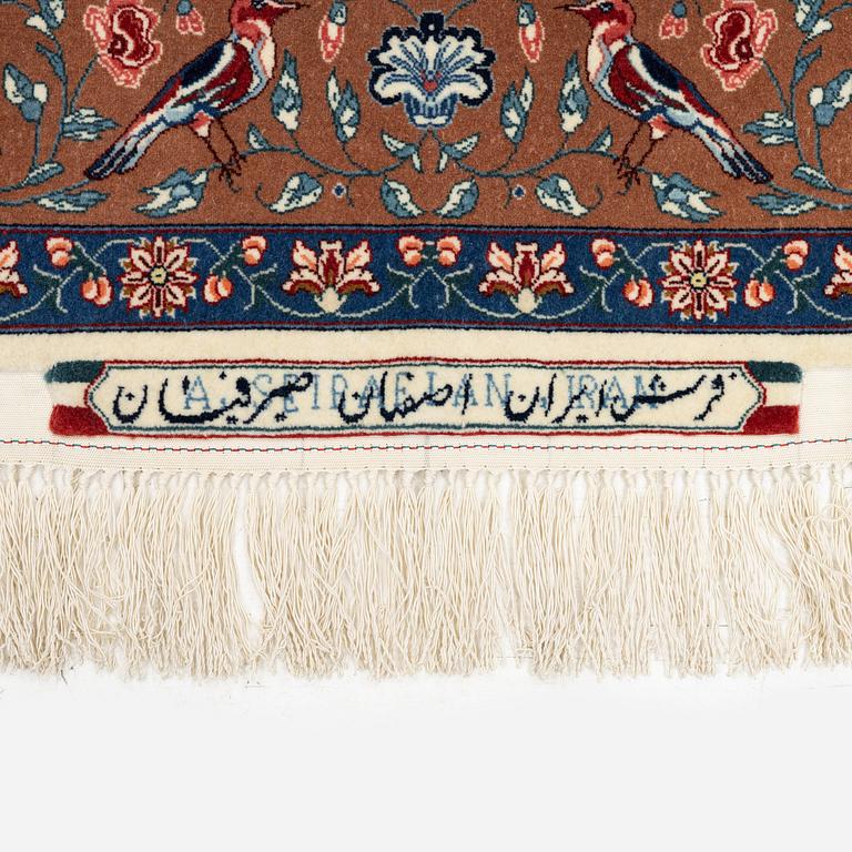 An Isfahan rug of 'Hunting' design, signed Seirafian (Ali Seirafian), c.166 x 109 cm.