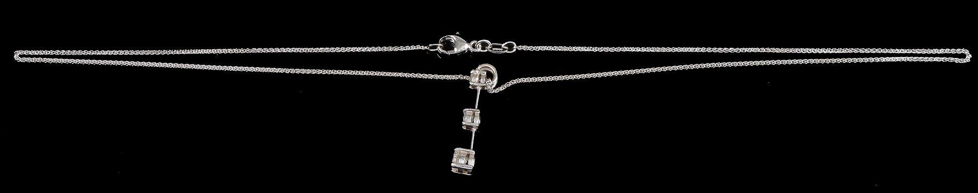 HÄNGSMYCKE, 18k vitguld med 3 briljantslipade diamanter, tot. ca 0.60 ct.