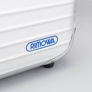 A set of three Rimowa bags later part of the 20th century.