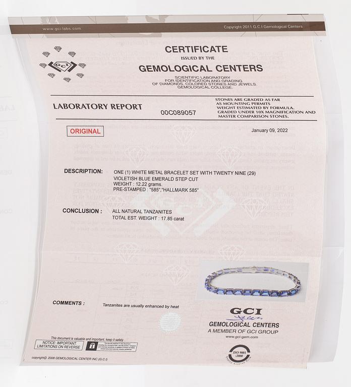 A 14K white gold bracelet with tanzanites. With Gemological center certificate.