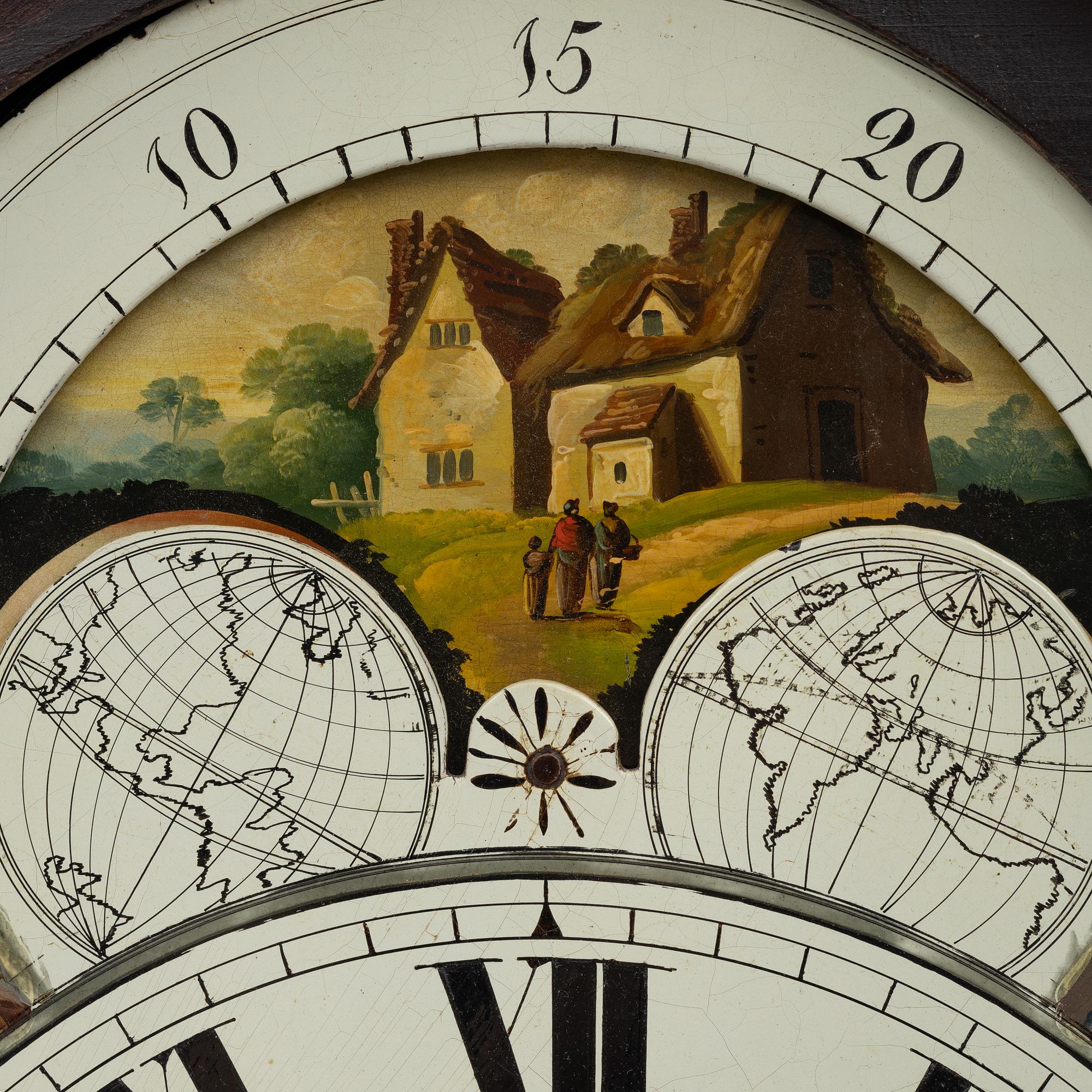 A long-case clock, England, 19th century.