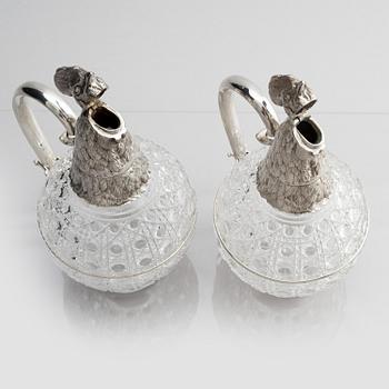 A pair of silver and cut-glass decanters, mark of Gratchev company, St. Petersburg 1908-1917.