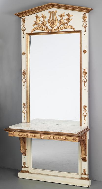 A mirror with console table, Empire, 19th Century.