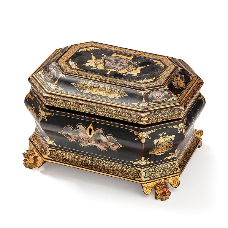 A Chinese lacquered tea caddy with pewter boxes, Qing dynasty, 19th Century.