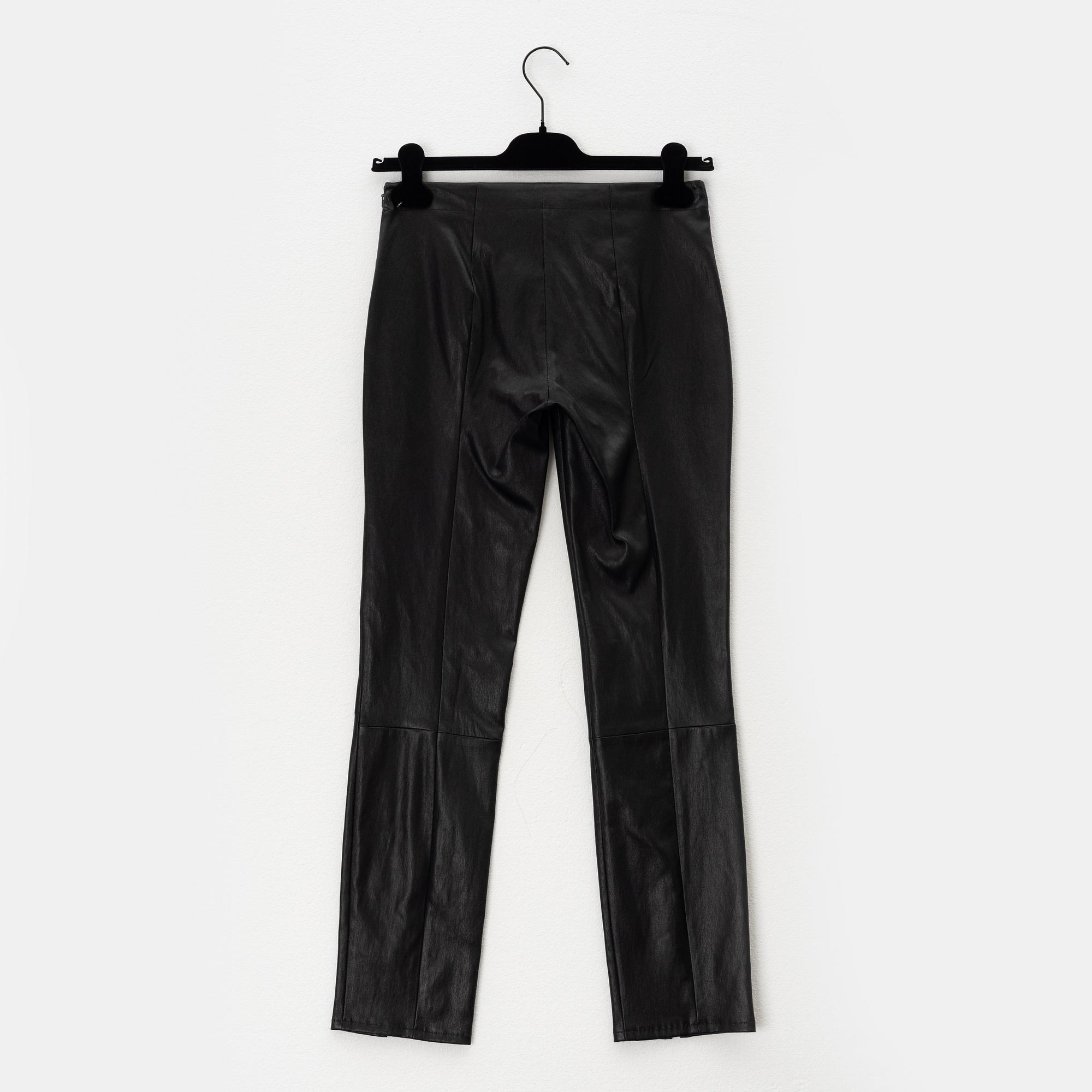 The Row, a black leather top and pants, size 0.