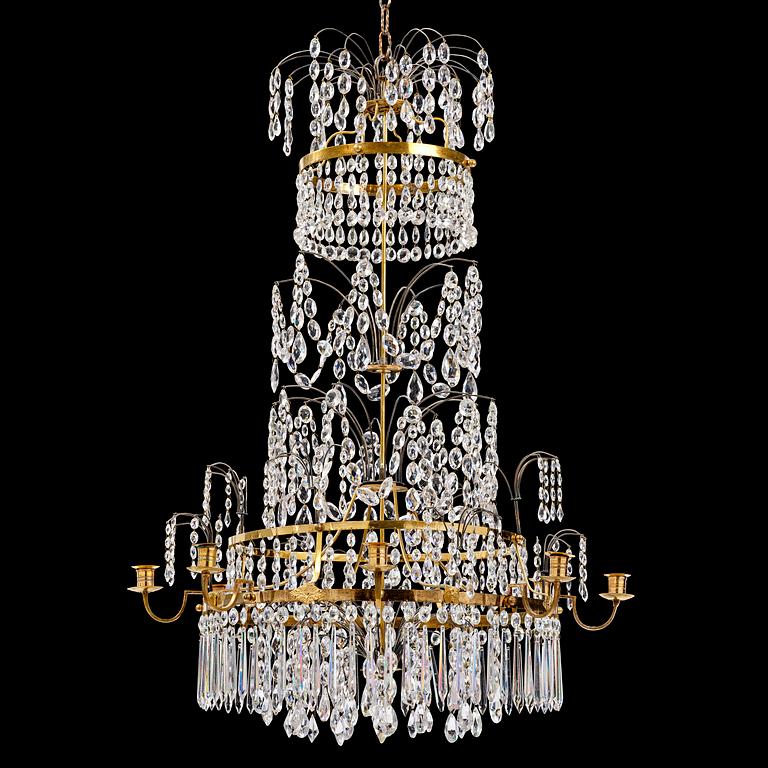 A late Gustavian gilt brass and cut glass eight-branch chandelier, Stockholm, late 18th century.