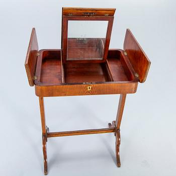 A mid 1800s dressign table.