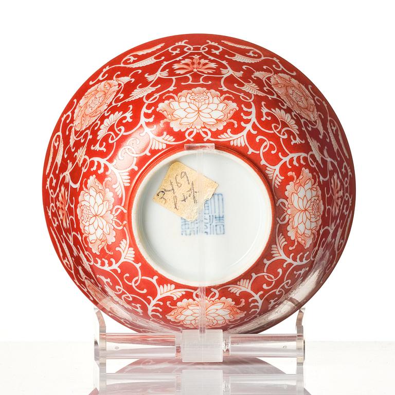 A coral red reverse decorated floral bowl, seal mark of Daoguang, Republic, 20th century.