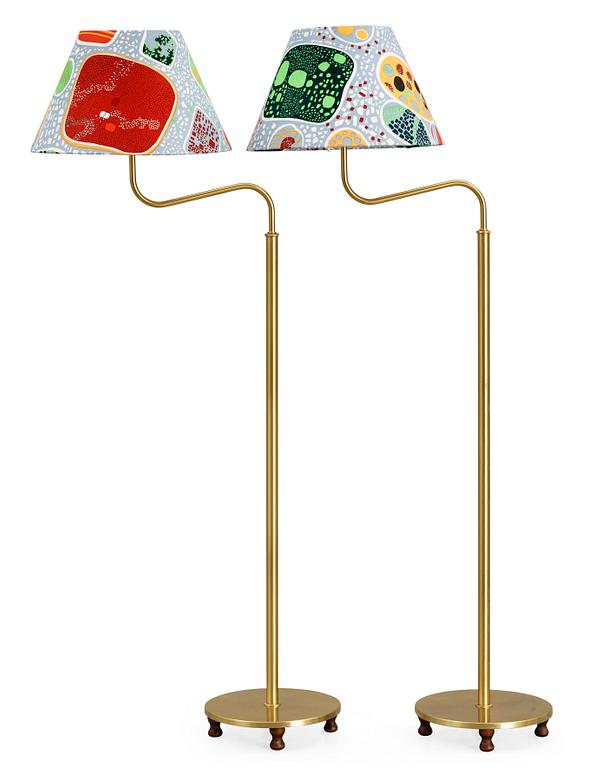 Two Josef Frank brass floor lamps by Svenskt Tenn, model 2568.