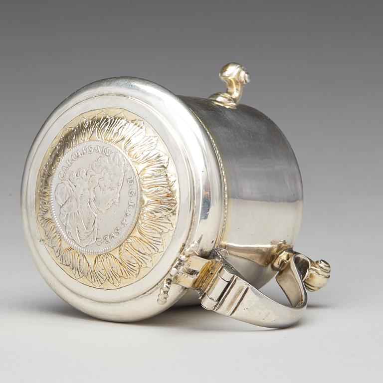 A Swedish 18th century parcel-gilt silver miniature tankard, mark of Bengt Biorn, Vasteras 1736.