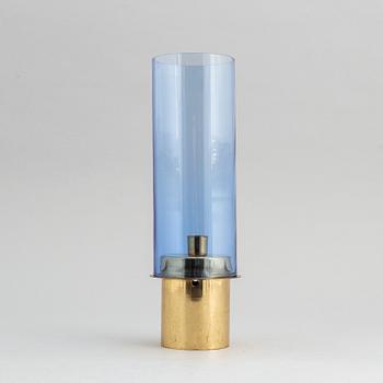 Hans-Agne Jakobsson, a brass and glass candle holder from Markaryd.