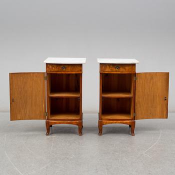 A pair of bedside tables, early 20th century.