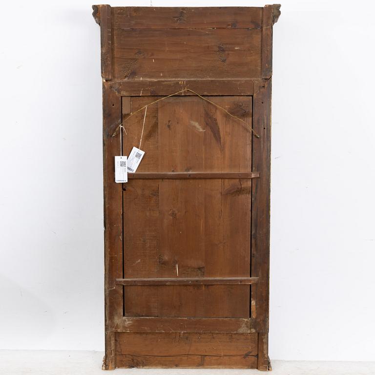 A late Gustavian giltwood mirror, circa 1800.