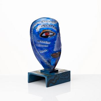 Ulrica Hydman-Vallien, a painted glass and iron sculpture of a face, Sweden.