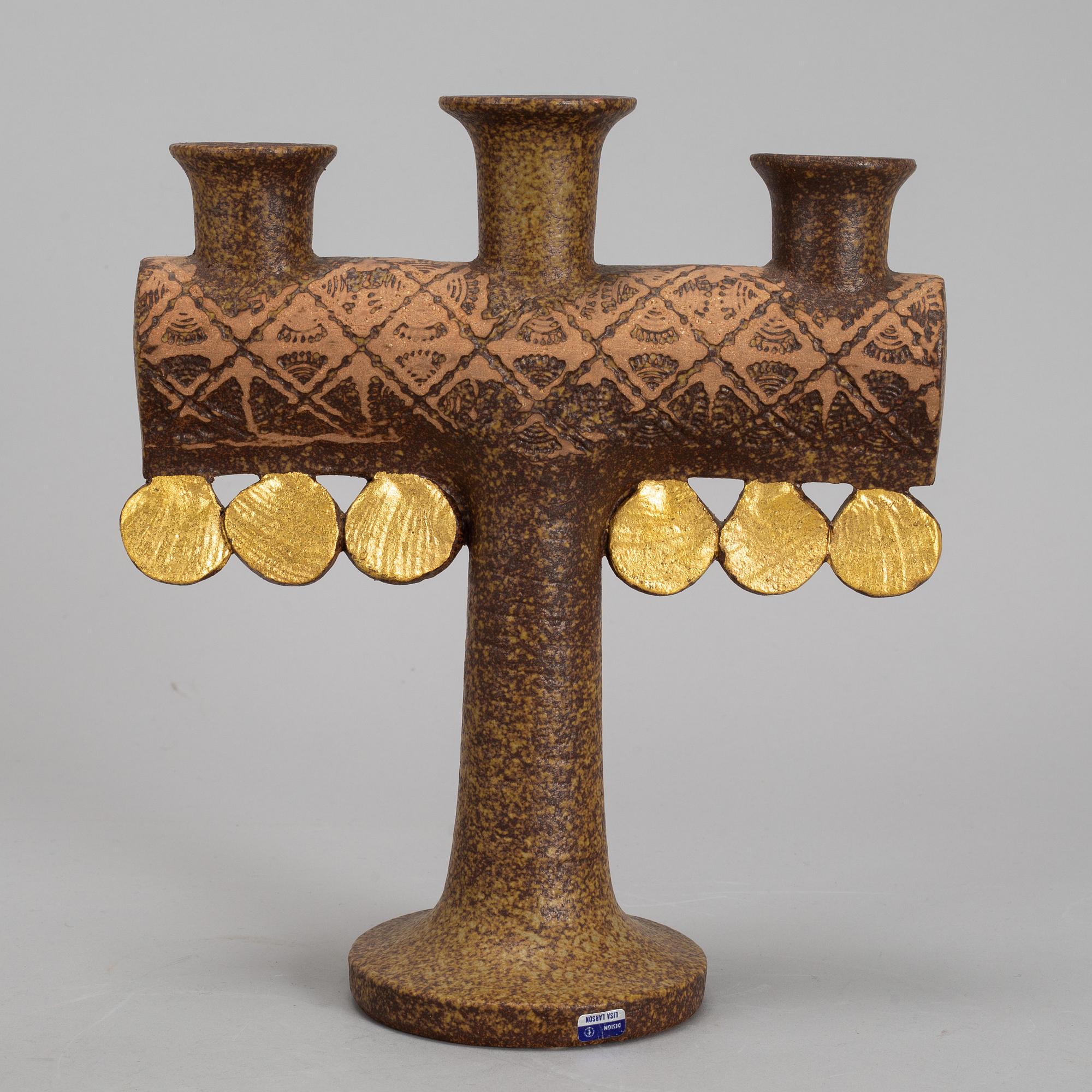 LISA LARSON, a stoneware candelabra and a figurine. Gustavsberg.