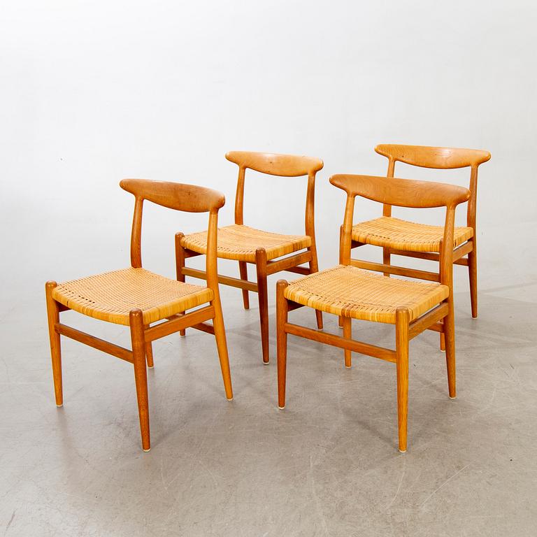 Four model 'W2' oak chairs by Hans Wegner for C.M. Madsen, Denmark, designed 1953.