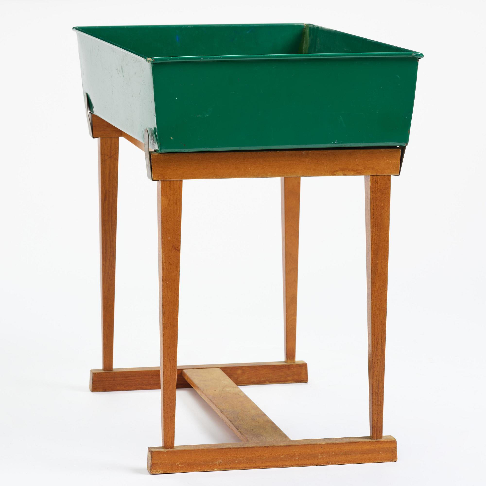 Josef Frank, a rare flower table with green lacquered box model "B 2084", Firma Svenskt Tenn, Sweden, 1950-60s.