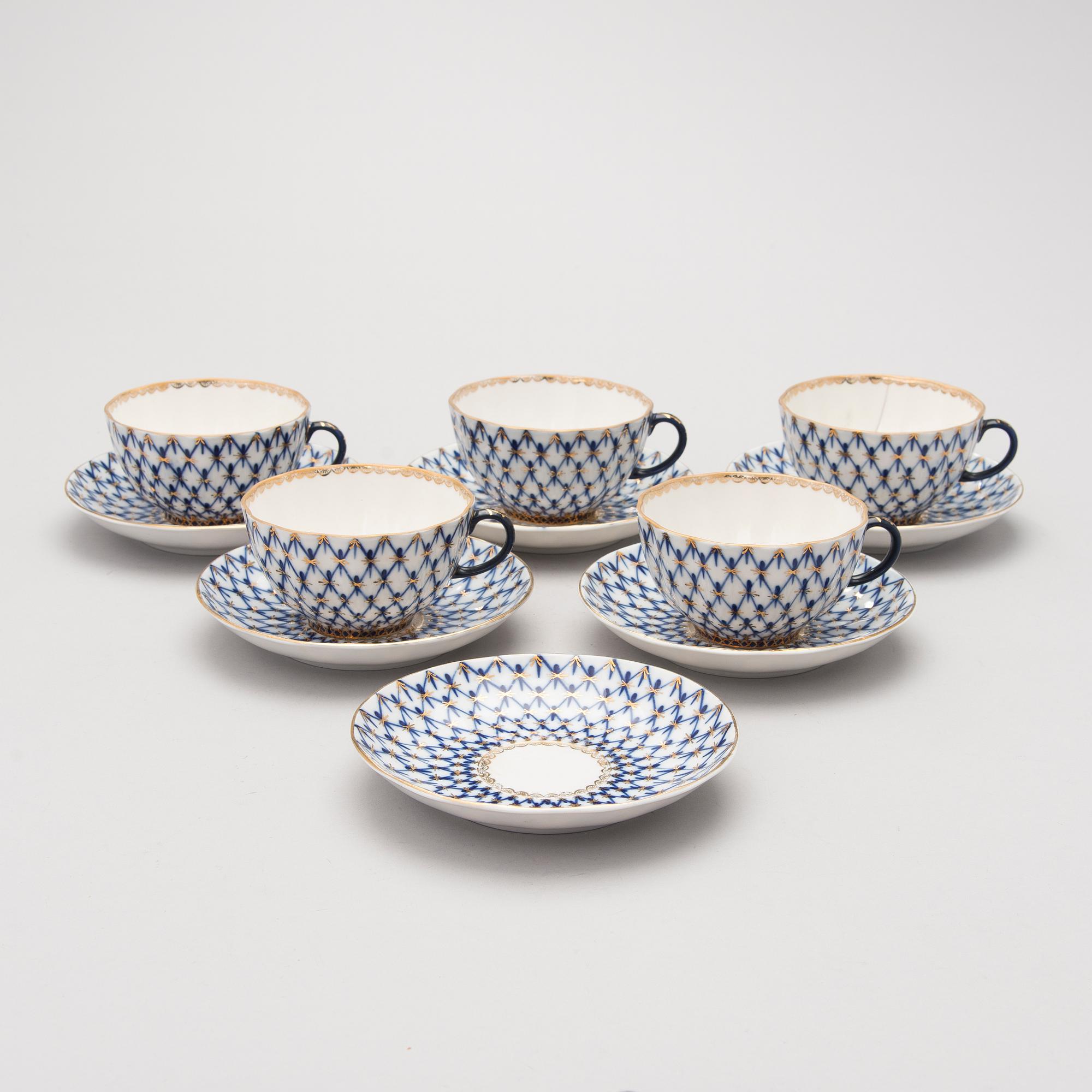 A 9-piece 'Cobalt net' porcelain tea set from Lomonosov, USSR.